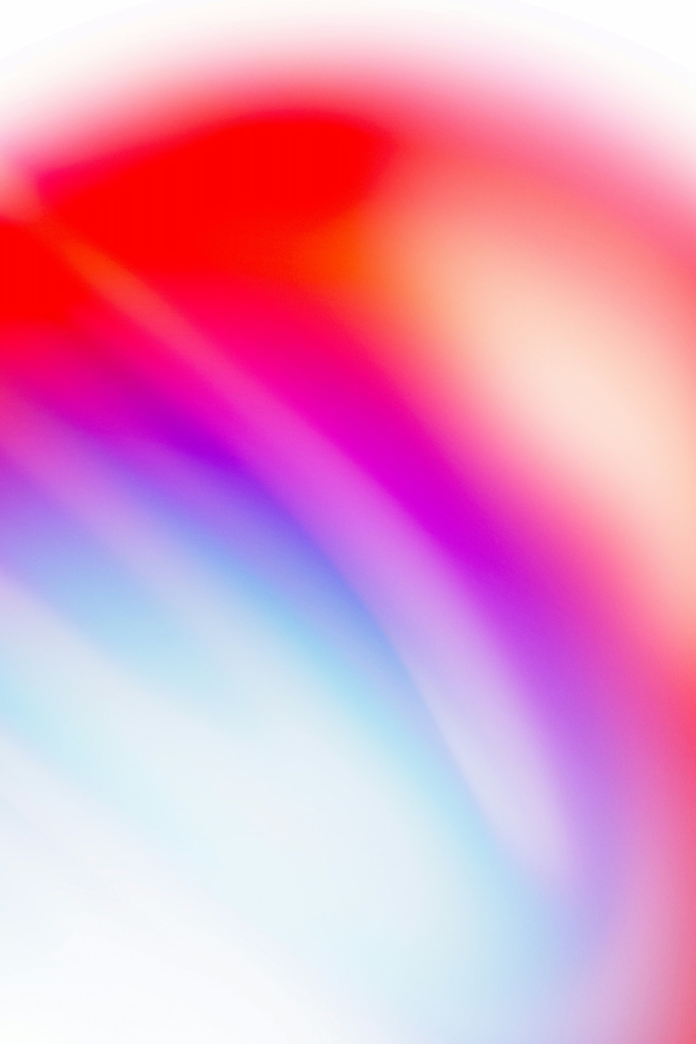 Abstract image of a blue, red, orange, and purple gradient